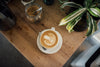 Latte art in a cup at Scout Coffee