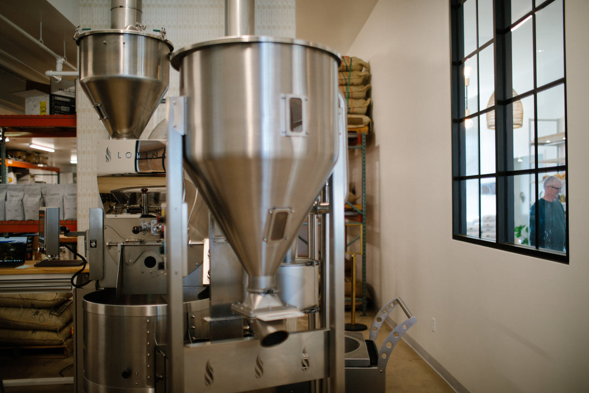 The Loring Kestrel 35 Kilo on the roastery floor in Morro Bay
