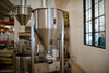 The Loring Kestrel 35 Kilo on the roastery floor in Morro Bay