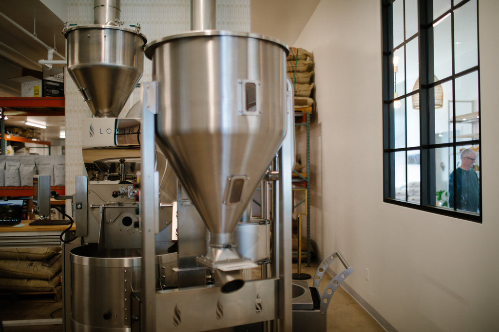 The Loring Kestrel 35 Kilo on the roastery floor in Morro Bay