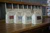 A row of HoneyCo kilo bags